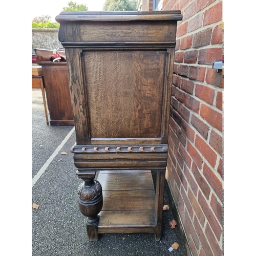 1399 - A 17th century style carved oak court cupboard, attributed to Titchmarsh & Goodwin, 124.5cm wide... 