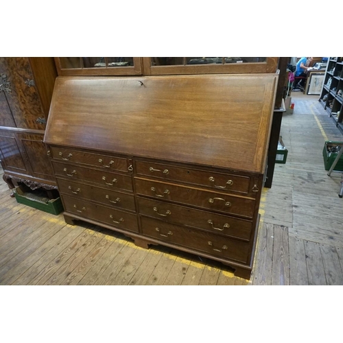 1420 - An unusually large early 20th century oak bureau bookcase, 155.5cm wide.