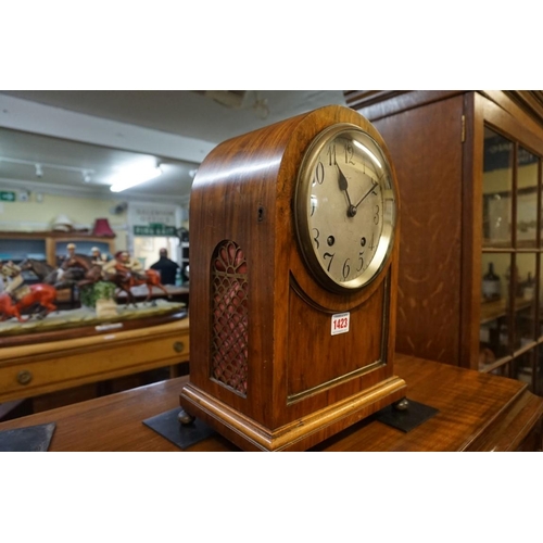 1423 - An early 20th century walnut dome top mantel clock, striking on two gongs, 35.5cm high, with pe... 