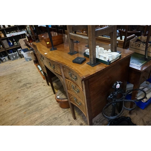 1434 - A George III mahogany and inlaid serpentine fronted sideboard, 138cm wide. ... 