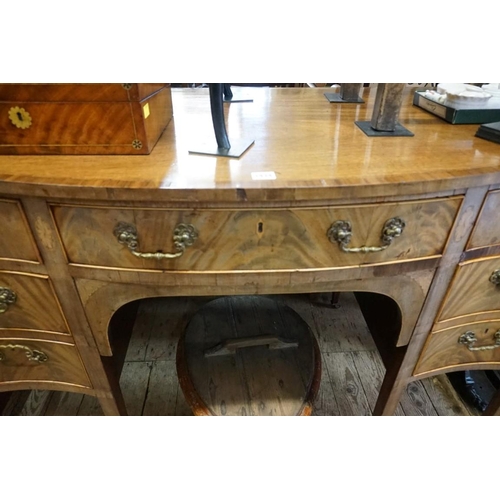 1434 - A George III mahogany and inlaid serpentine fronted sideboard, 138cm wide. ... 