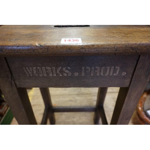 1436 - An old beech wood factory stool, inscribed 'Works Prod'.