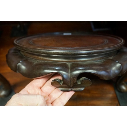 1443 - A large Chinese hardwood stand, aperture 30cm. 