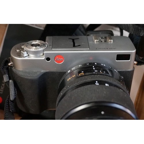 1447 - A Leica Digilux 3 digital camera, with instructions and related.