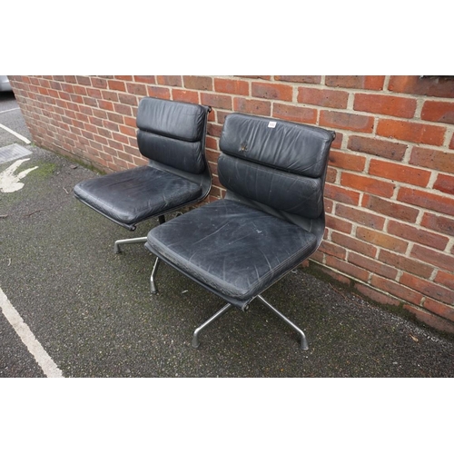 1453 - A pair of 1960s Ray & Charles Eames EA208 chairs, (lacking arms).