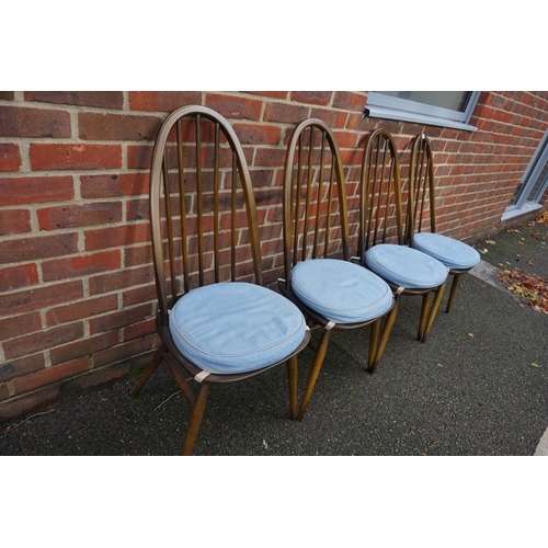 1455 - A set of four Ercol dining chairs, gold stickers. 