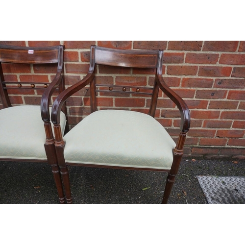 1456 - A set of six antique mahogany dining chairs, to include a pair of elbow chairs.