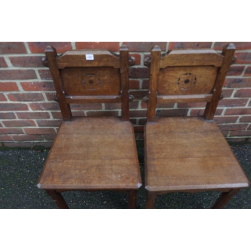 1457 - A pair of Gothic oak side chairs.