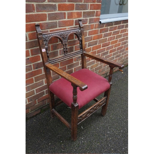 1458 - An antique carved fruitwood elbow chair, in the 17th century style.