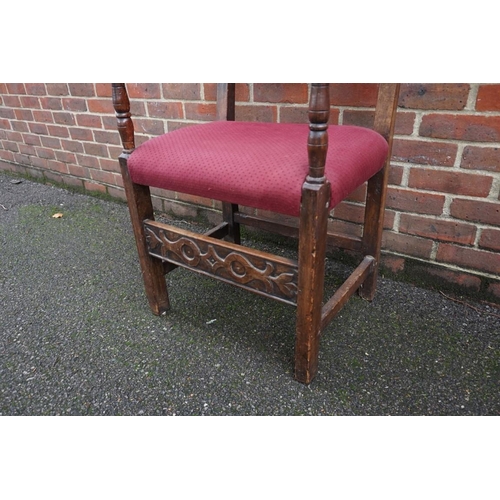 1458 - An antique carved fruitwood elbow chair, in the 17th century style.