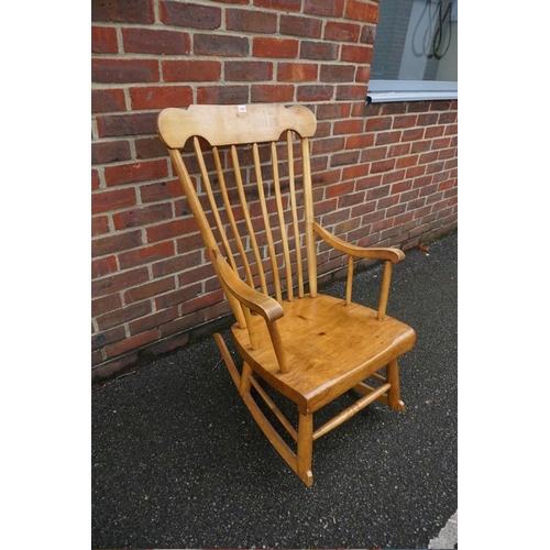 1460 - A pine and birch rocking chair.