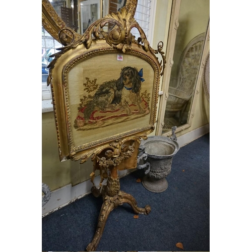 1479 - A 19th century gilt framed tripod firescreen, with embroidered panel of spaniel, 127cm high.... 