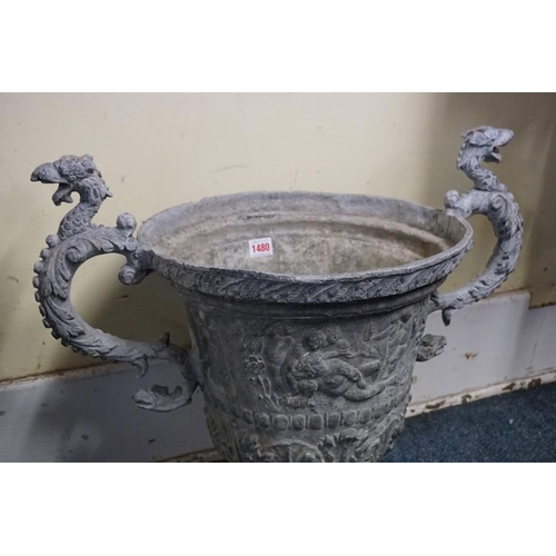 1480 - A pair of lead twin handled urns, probably 17th/18th century, with griffin form handles, 59cm wide.... 