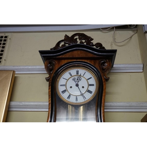 1492 - A walnut and ebonized Vienna wall clock, 103cm high, with two weights and pendulum. ... 