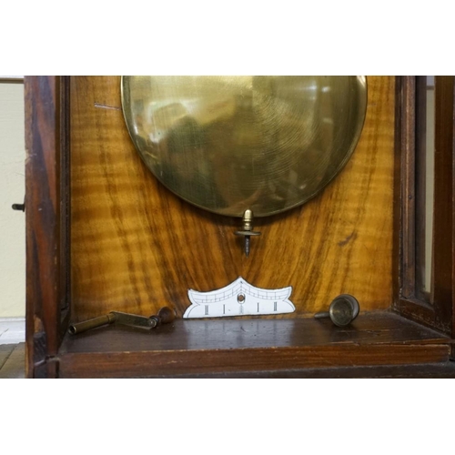 1492 - A walnut and ebonized Vienna wall clock, 103cm high, with two weights and pendulum. ... 