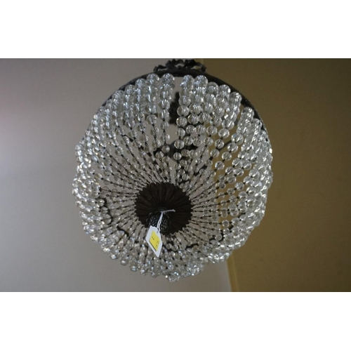 1505 - A neo-classical style silvered metal and facetted bead ceiling light, 72cm high. ... 