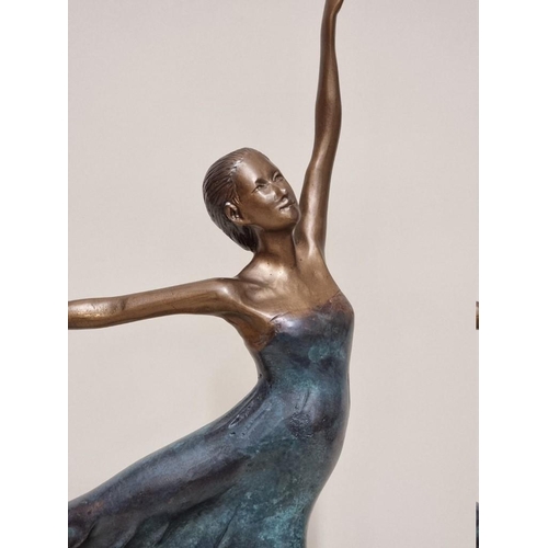 1512 - A bronze figure of a ballerina, on ebonized base, 55cm  high.