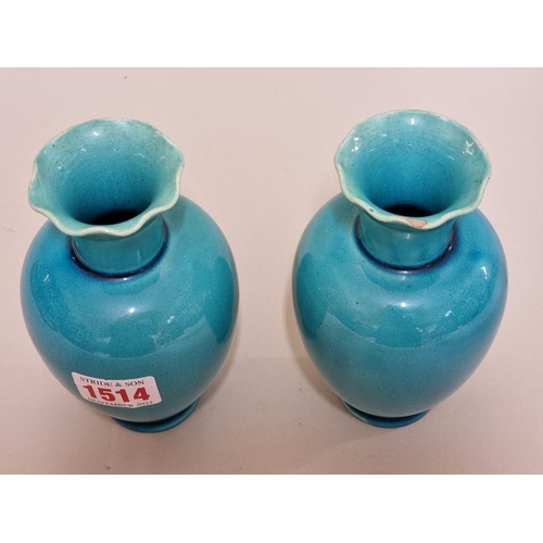 1514 - A pair of Burmantofts faience turquoise vases, design number 83, 14cm high.