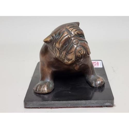 1525 - A bronze seated British bulldog, on rectangular slate base, 15cm wide.