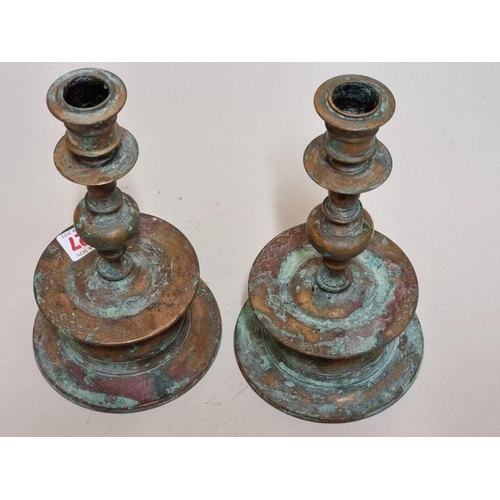 1527 - A pair of Swedish brass candlesticks, inscribed 'Skultuna, Bruk', 20cm high.