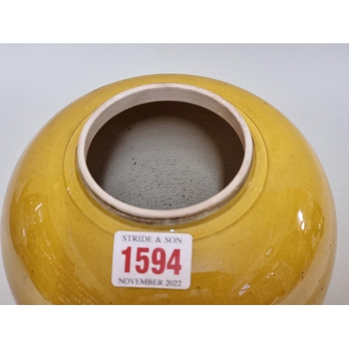 1594 - A Chinese yellow monochrome jar, 16cm high, (drilled to base), on wood stand. ... 