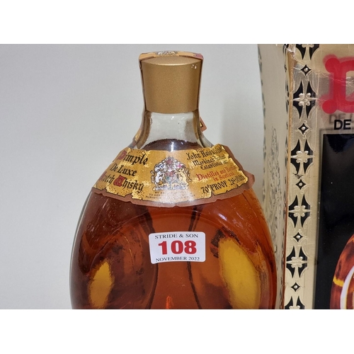 108 - A 26 2/3 fl.oz. bottle of Dimple whisky, 1960s bottling, in oc.