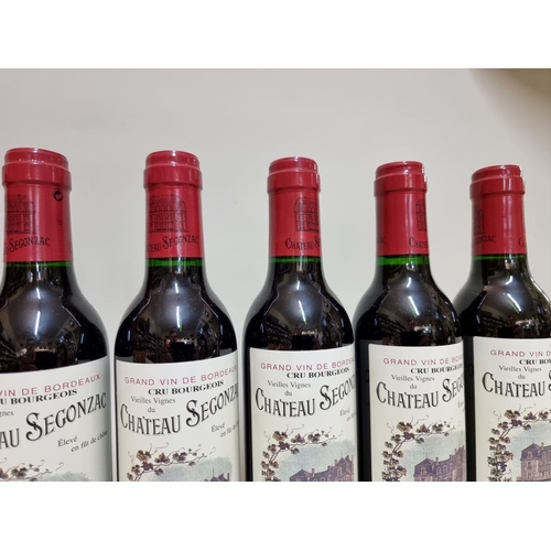 11 - Nine 37.5cl bottles Chateau Segonzac, 1995. (9)