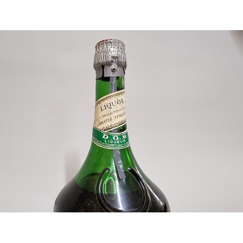 12 - A 23 3/4 fl.oz. bottle of DOM Benedictine liqueur, circa 1960s/70s bottling.