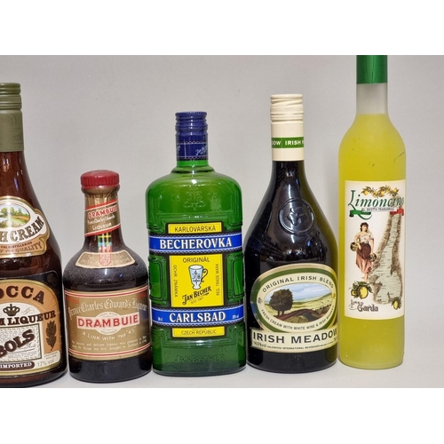 135 - A group of liqueurs and similar, to include: a 37.5cl Drambuie; and a 70cl Creme de Cassis. (7)... 