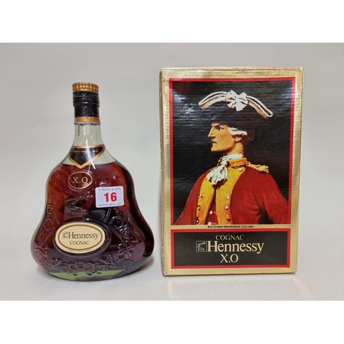 16 - A 24 fl.oz. bottle of Hennessy XO cognac, 1960s/70s bottling, in card box.