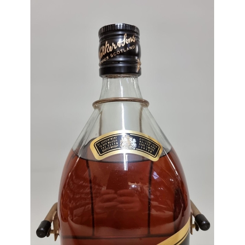 22 - A 4.5 litre bottle of Johnny Walker 'Black Label' blended whisky, in cradle.