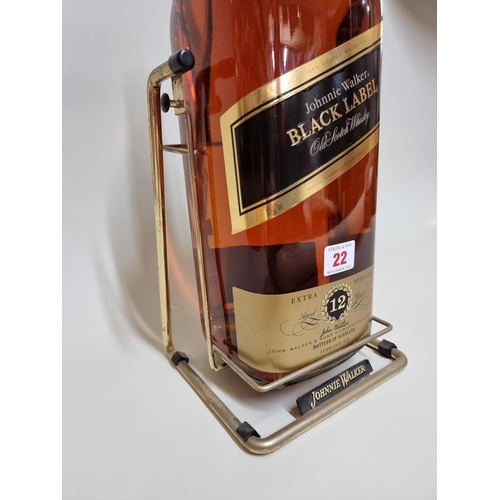 22 - A 4.5 litre bottle of Johnny Walker 'Black Label' blended whisky, in cradle.