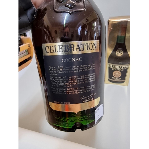 41 - A 1 litre bottle of Camus 'Celebration' Cognac, in oc.