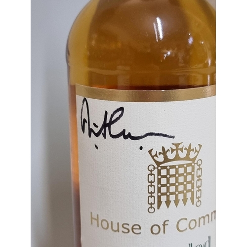 46 - A 70cl bottle of House of Commons 12 year old whisky, signed by David Cameron, in card box.... 