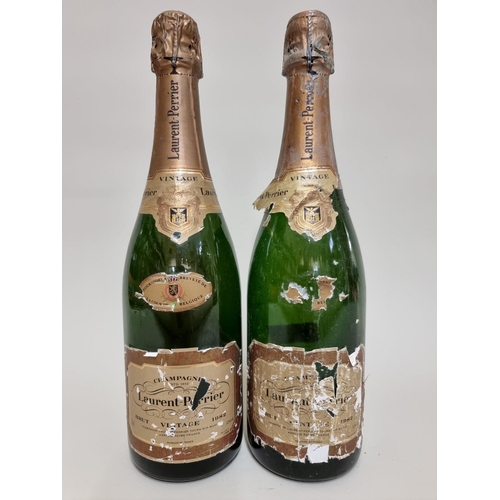 54 - Two 75cl bottles of Laurent Perrier 1982 vintage champagne. (2)