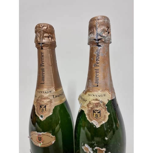 54 - Two 75cl bottles of Laurent Perrier 1982 vintage champagne. (2)