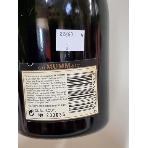 67 - A 75cl bottle of Mumm 'Cordon Rouge' 1990 vintage champagne.