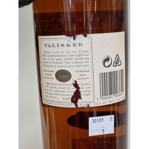 68 - A 1 litre bottle of Talisker 10 year old whisky, 45.8% abv.