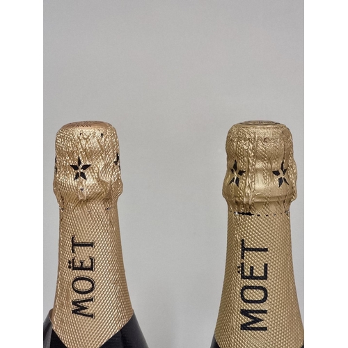 74 - Two 75cl bottles of Moet & Chandon 'Premier Cuvee' NV champagne. (2)