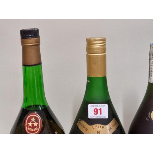 91 - Three 1 litre bottles of brandy, to include: an old Otard 'Grand Fine' Cognac. (3)