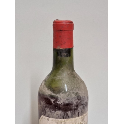 95 - A 75cl bottle of Chateau Margaux 1952.