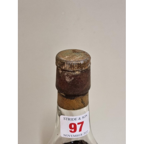 97 - A 24 fl.oz. bottle of J & B 1922 vintage Grande Champagne Cognac.