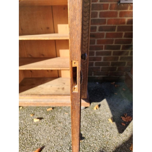 1157 - A Continental carved oak cupboard, 91cm wide. 