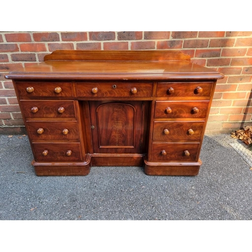 1159 - A Victorian mahogany pedestal desk, with kneehole cupboard, 122cm wide. 