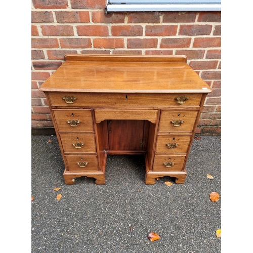 1180 - A George III mahogany kneehole chest, 86cm wide.