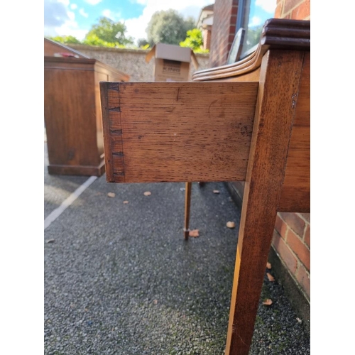 1407 - An antique mahogany serpentine fronted side table, the frieze drawer with ivory escutcheon, 101cm wi... 