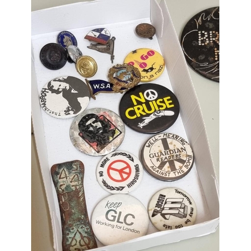 1650 - A small collection of vintage badges and buttons, to include CND and LBJ examples.