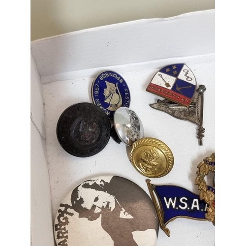 1650 - A small collection of vintage badges and buttons, to include CND and LBJ examples.