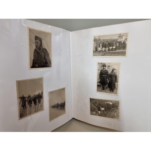 1674 - An interesting photograph album, containing 92 World War II black and white snapshots, with owner's ... 