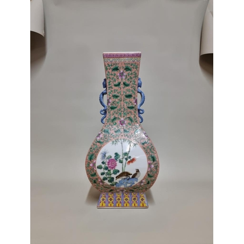 1690 - A large Chinese famille rose twin handled vase, Yongzheng six character mark to base, 44.5cm high.... 